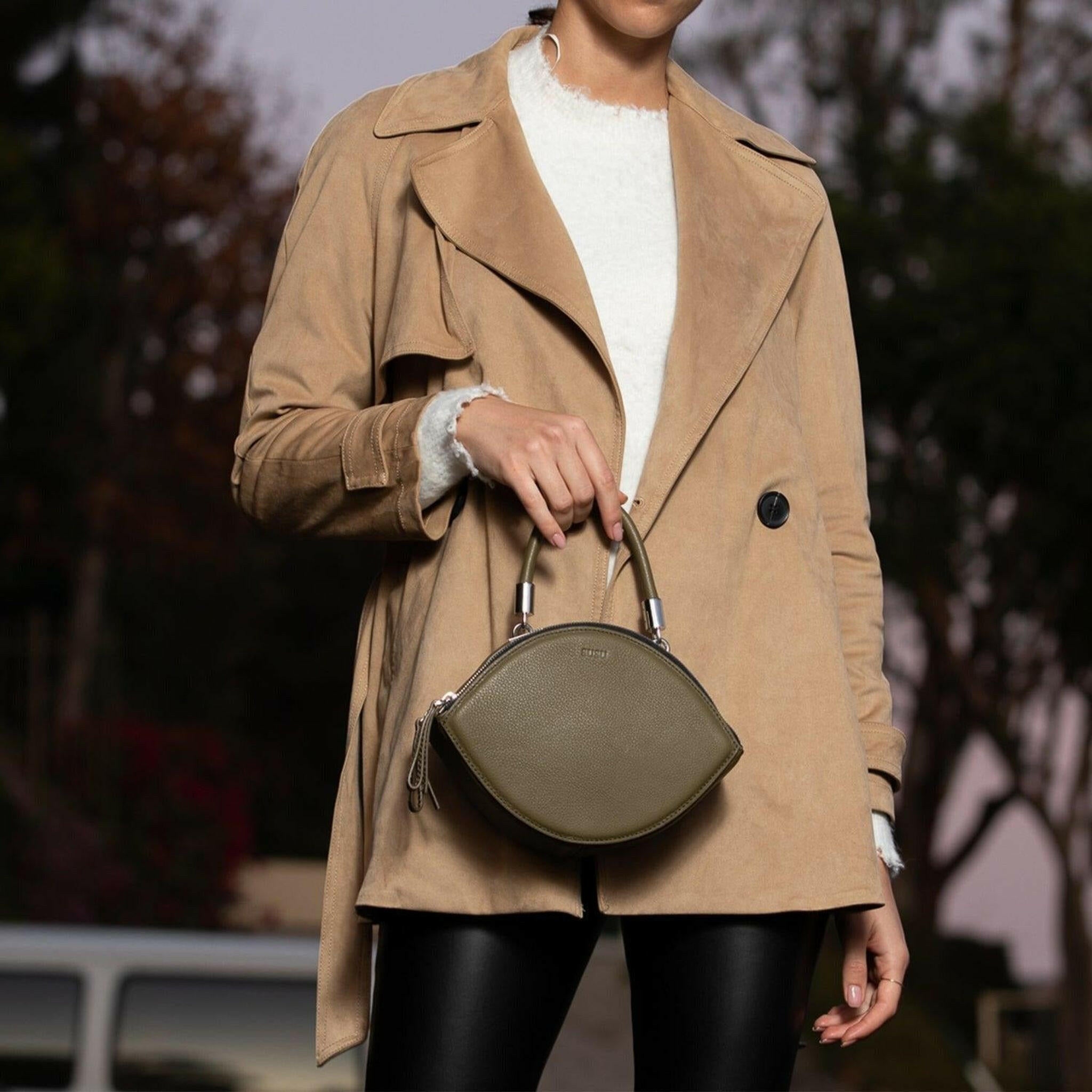Kiss Circle Shape Leather Crossbody Bag in Olive Green.