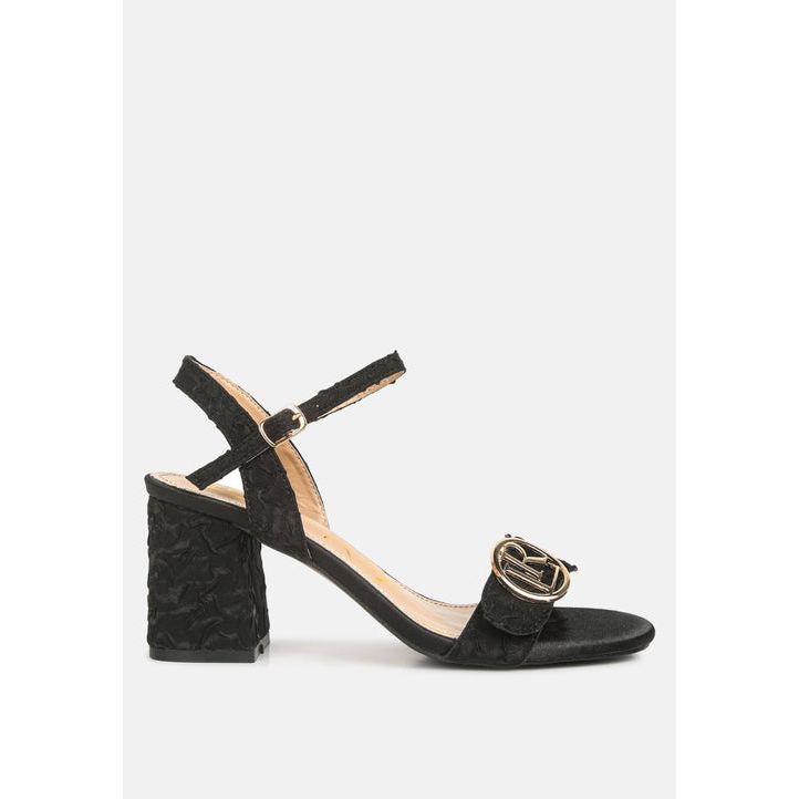 chaplet textured block heel sandals.