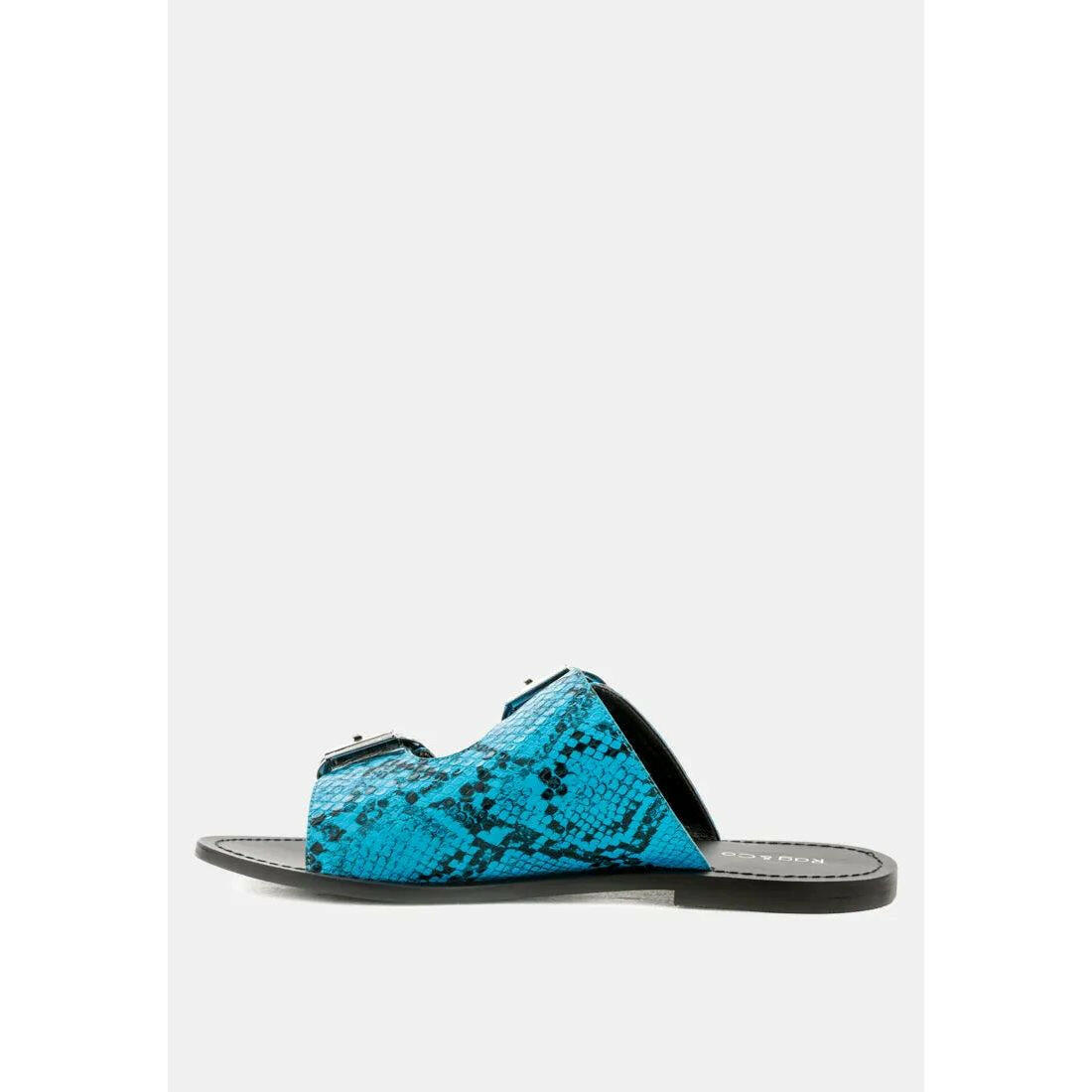 Kelly Flat Sandal With Buckle Straps.