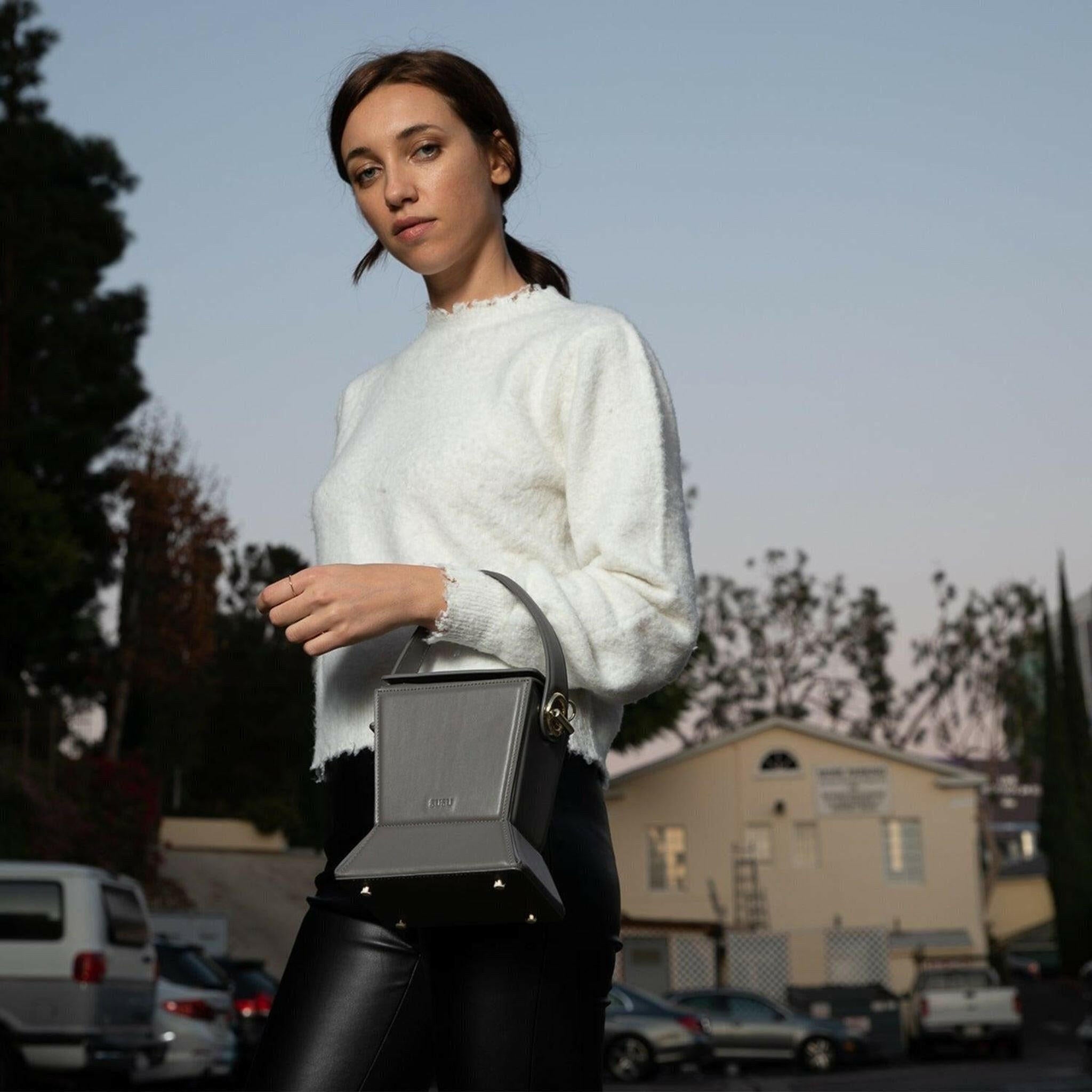 Amber Leather Bucket Bag in Gray.