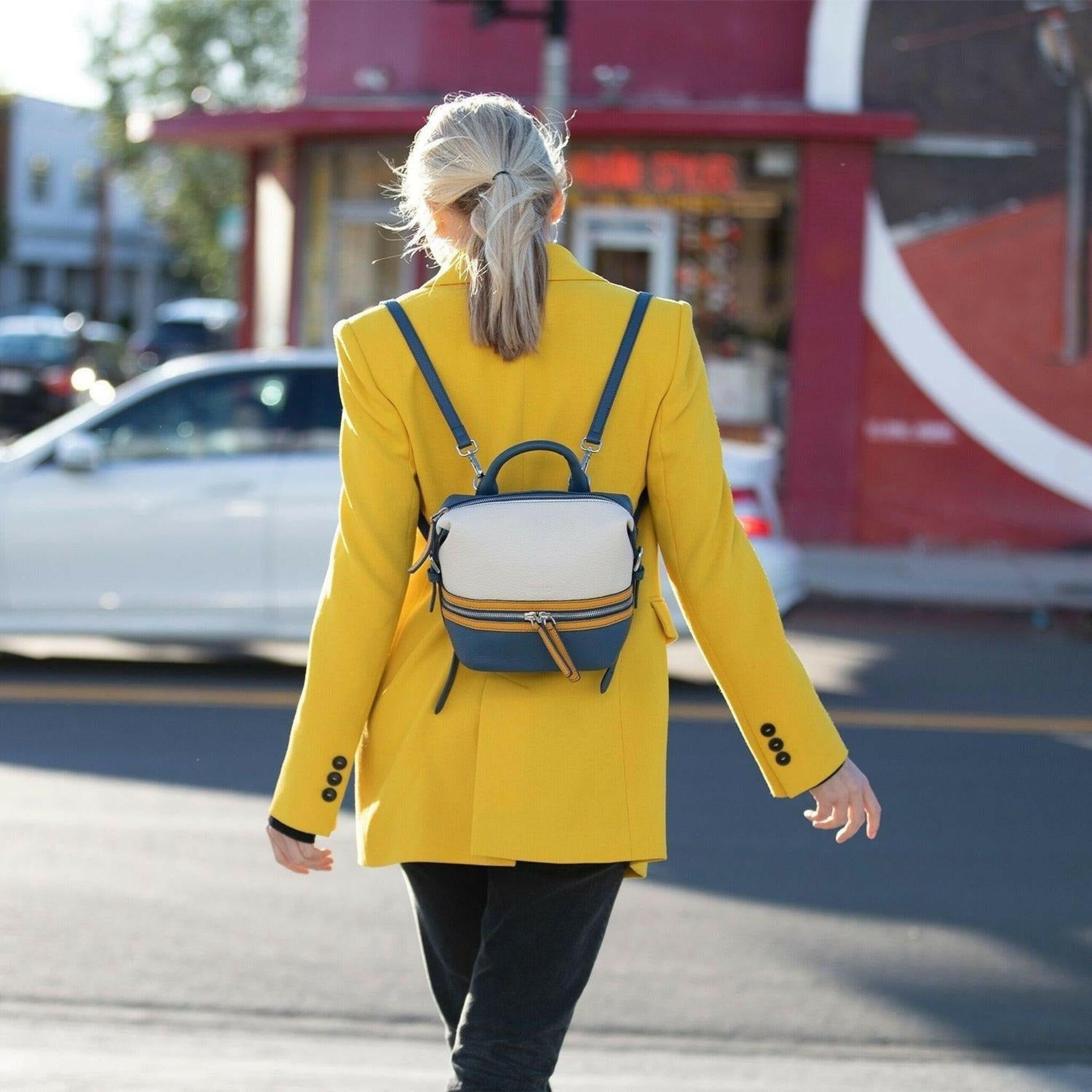 Ashley Small Leather Backpack in White Yellow Blue.