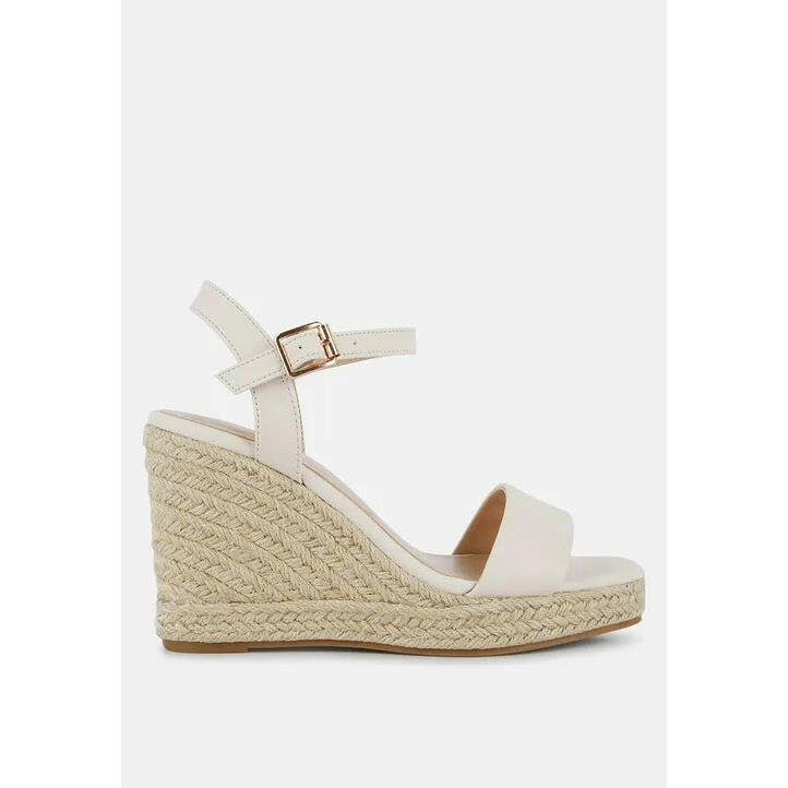 Augie Woven Wedge Sandals.