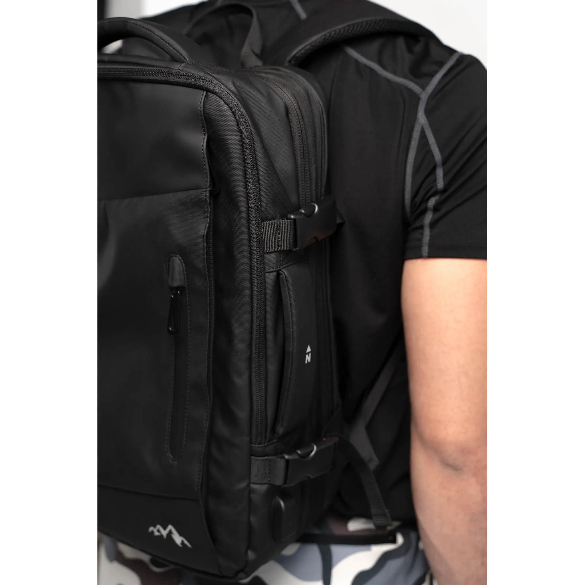 "Voyager" Expandable Backpack With Built-In Rain Coat.