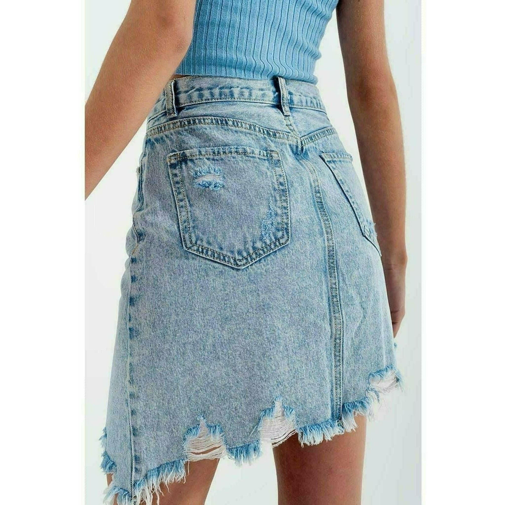 Distressed Denim Skirt in Bleach Wash.