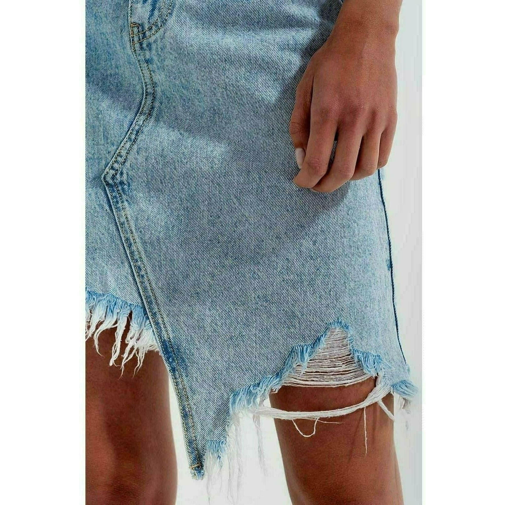 Distressed Denim Skirt in Bleach Wash.