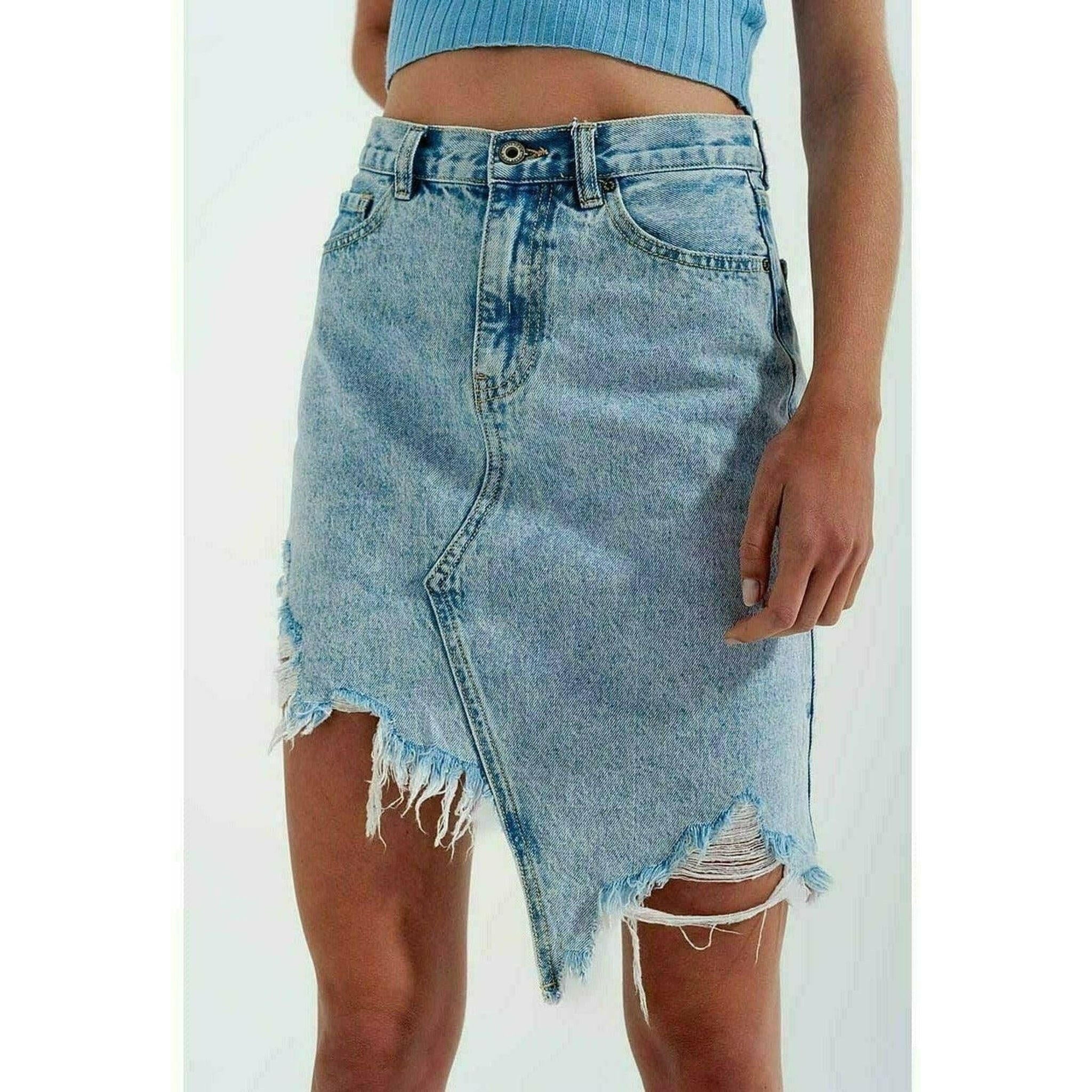 Distressed Denim Skirt in Bleach Wash.