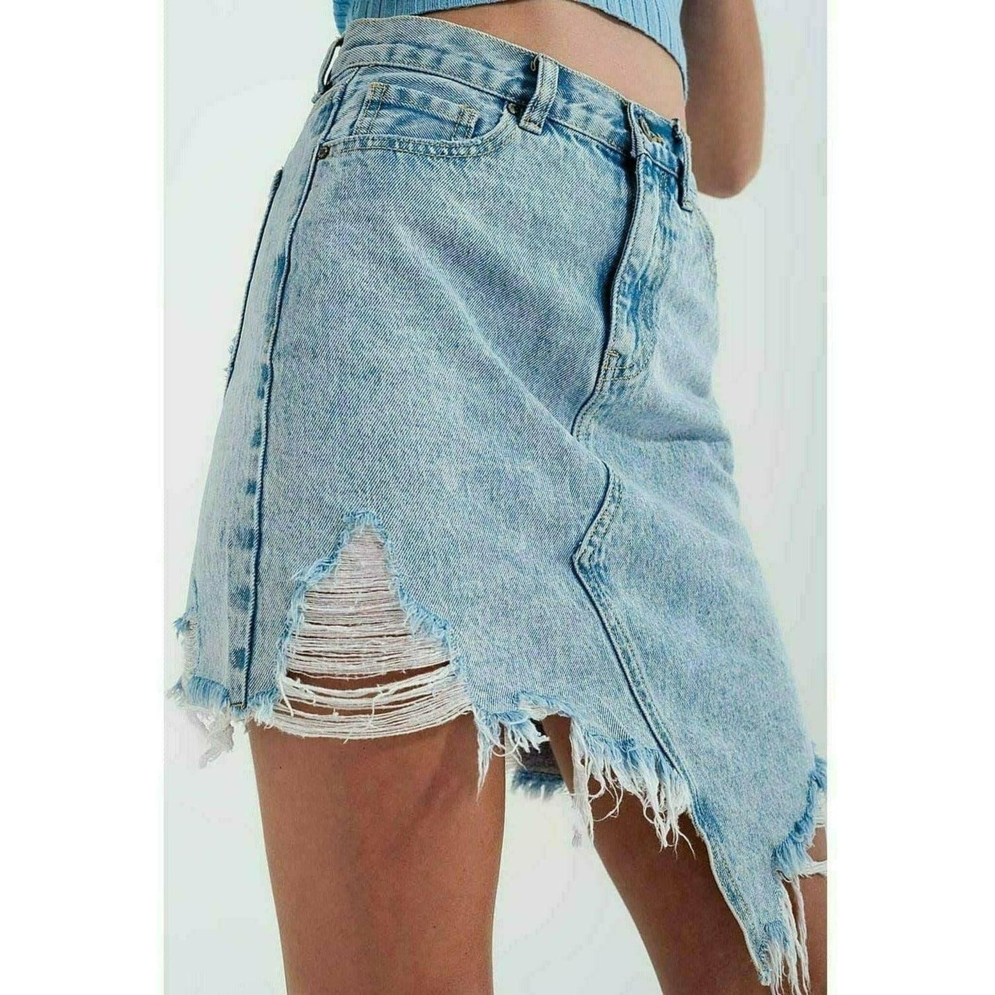 Distressed Denim Skirt in Bleach Wash.