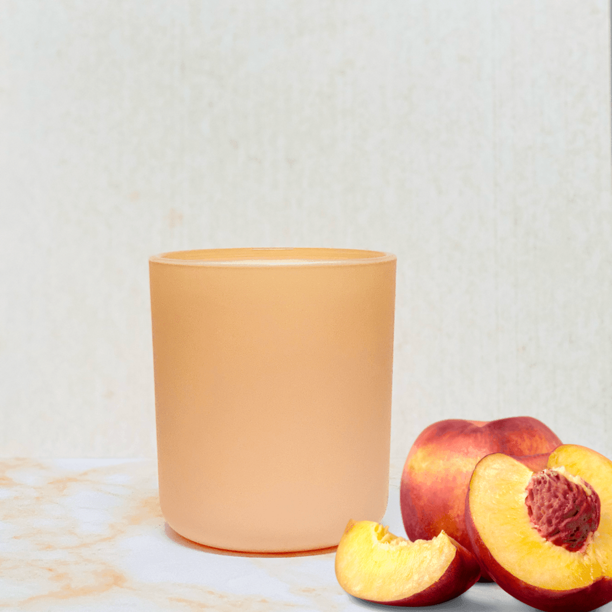 Fresh Peaches Scented Candle.