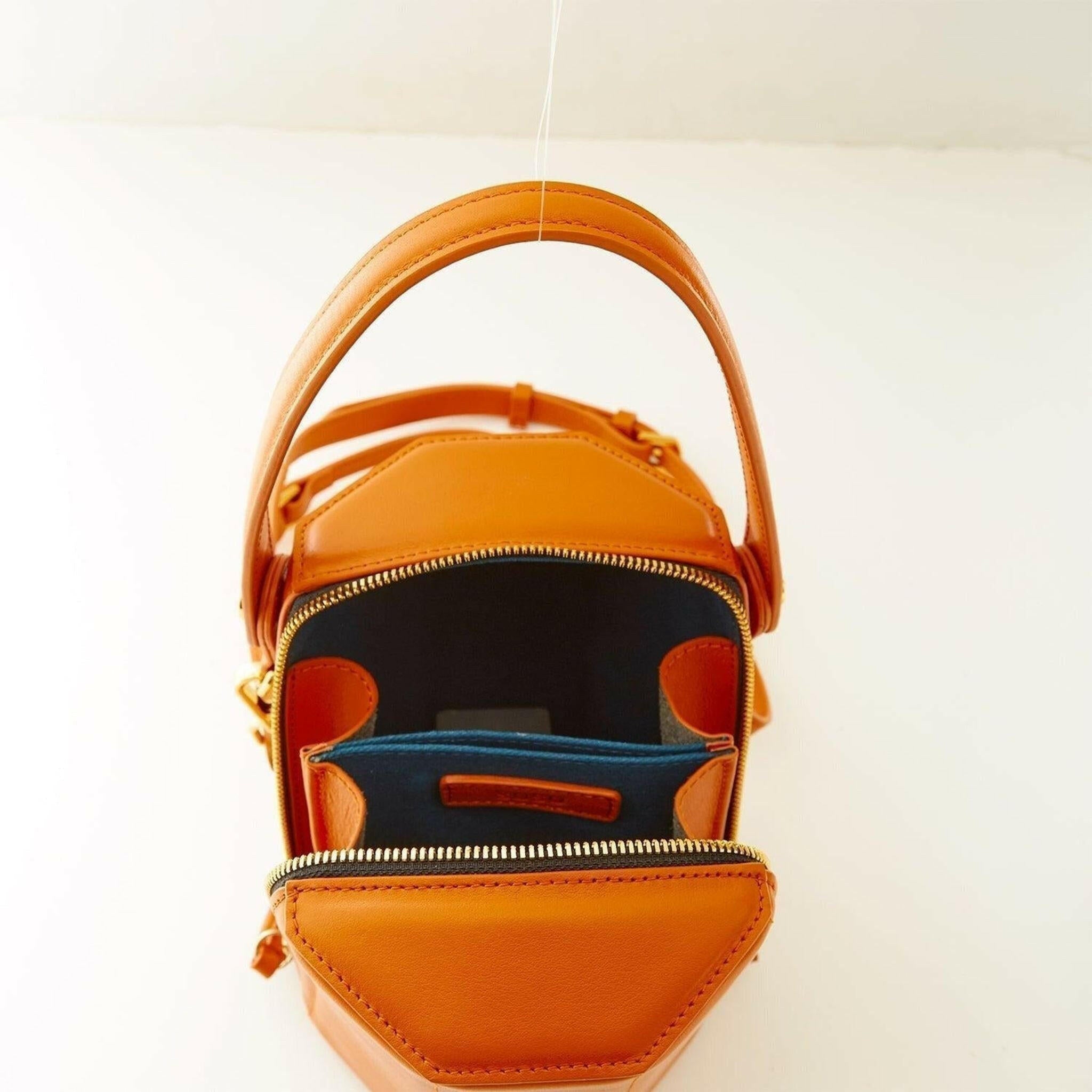 Harper Leather Bucket Bag in Orange.