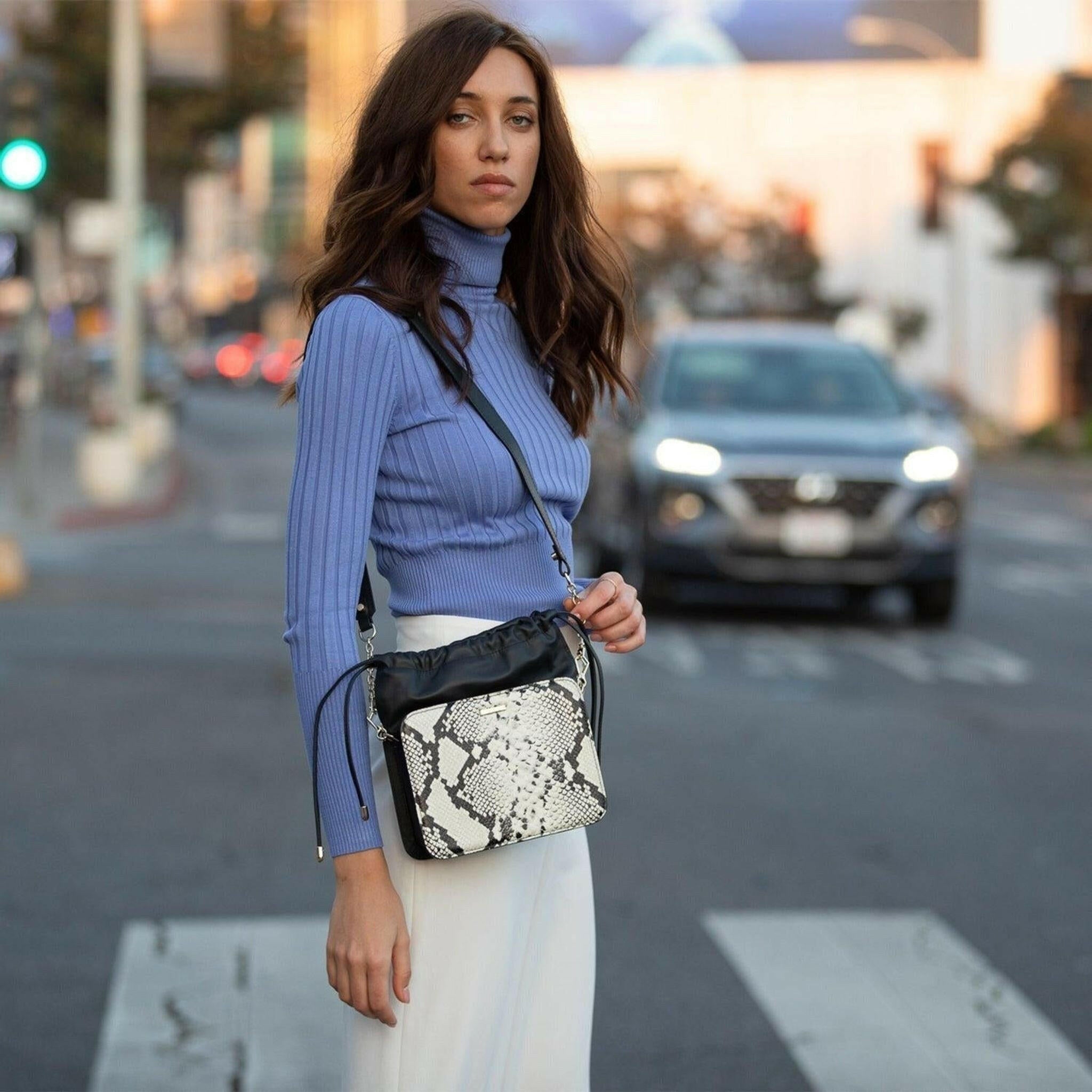 Patricia Leather Bucket Bag in Black Snakeskin Design.