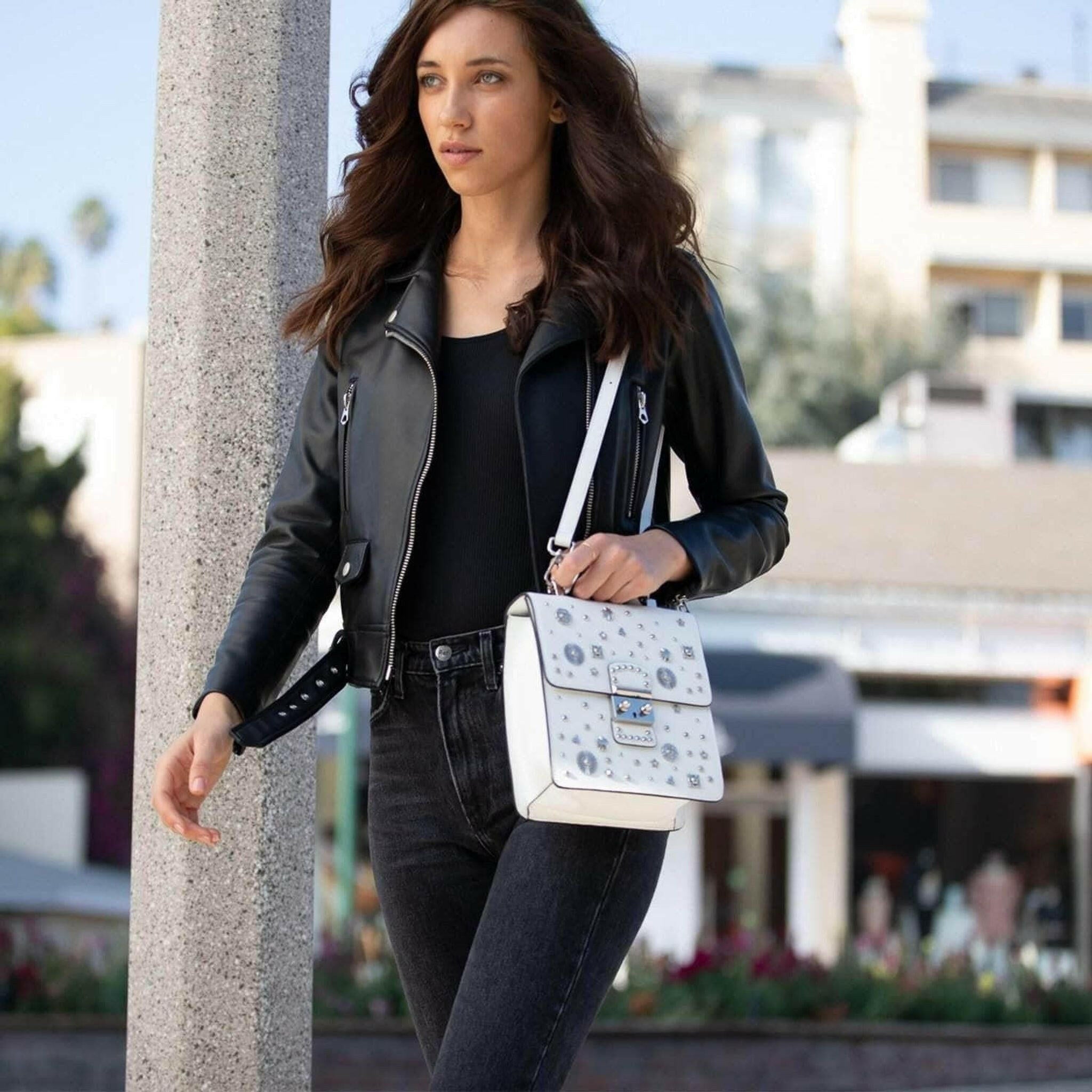 The Hollywood Backpack Leather Purse in White.