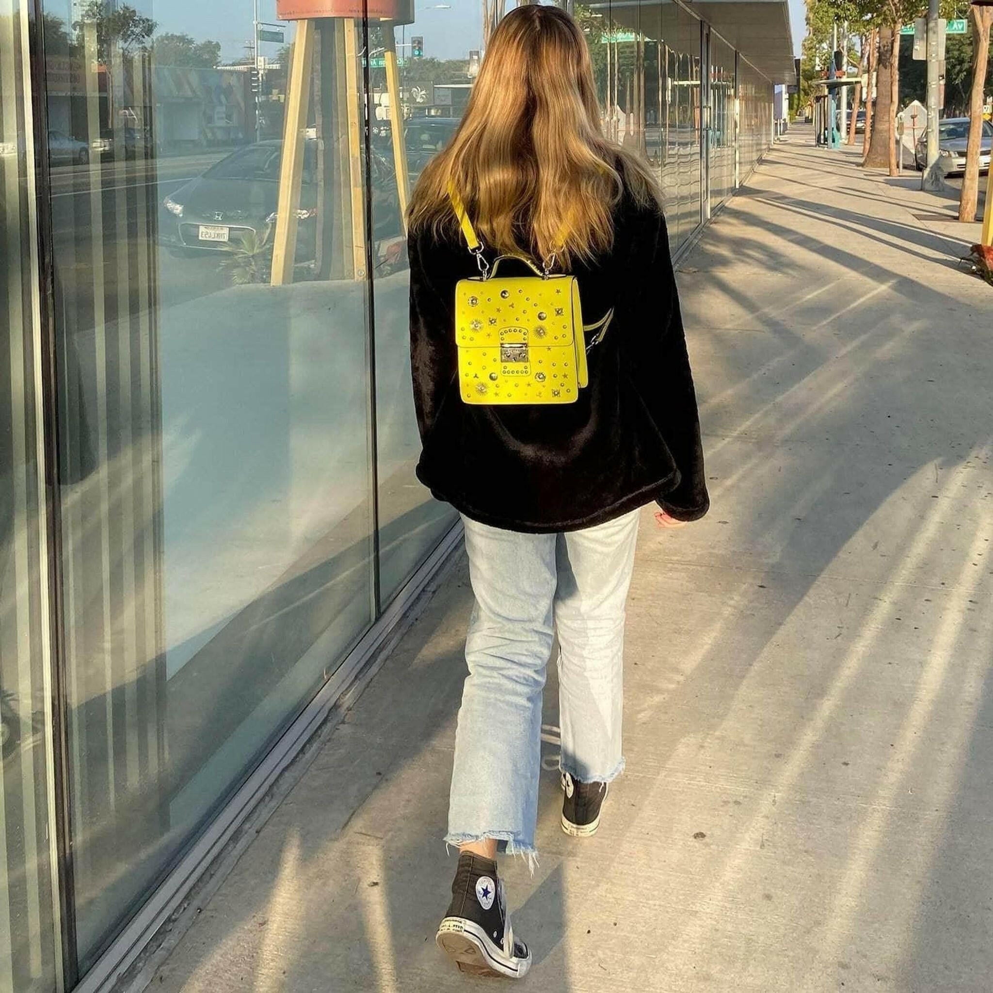 The Hollywood Backpack Purse Leather in Yellow.