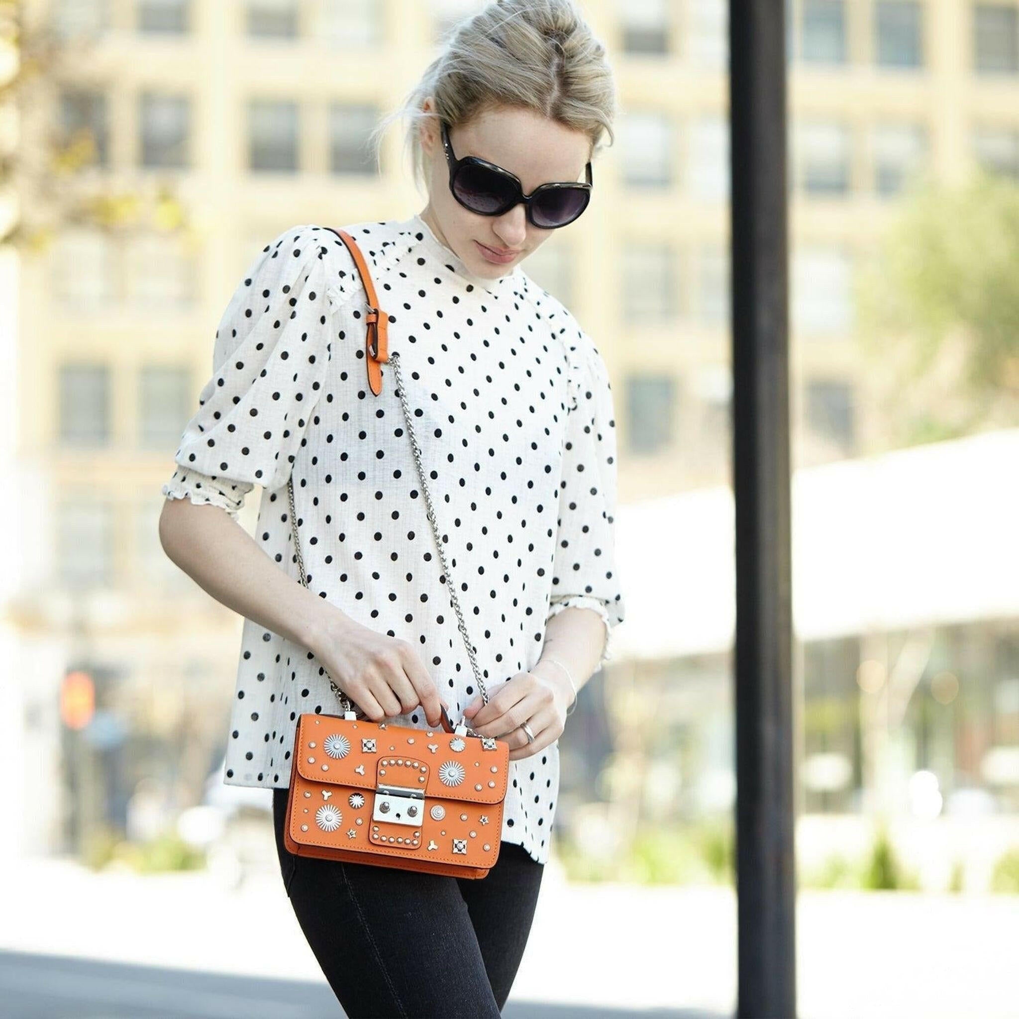 The Hollywood Leather Crossbody Bag in Orange.