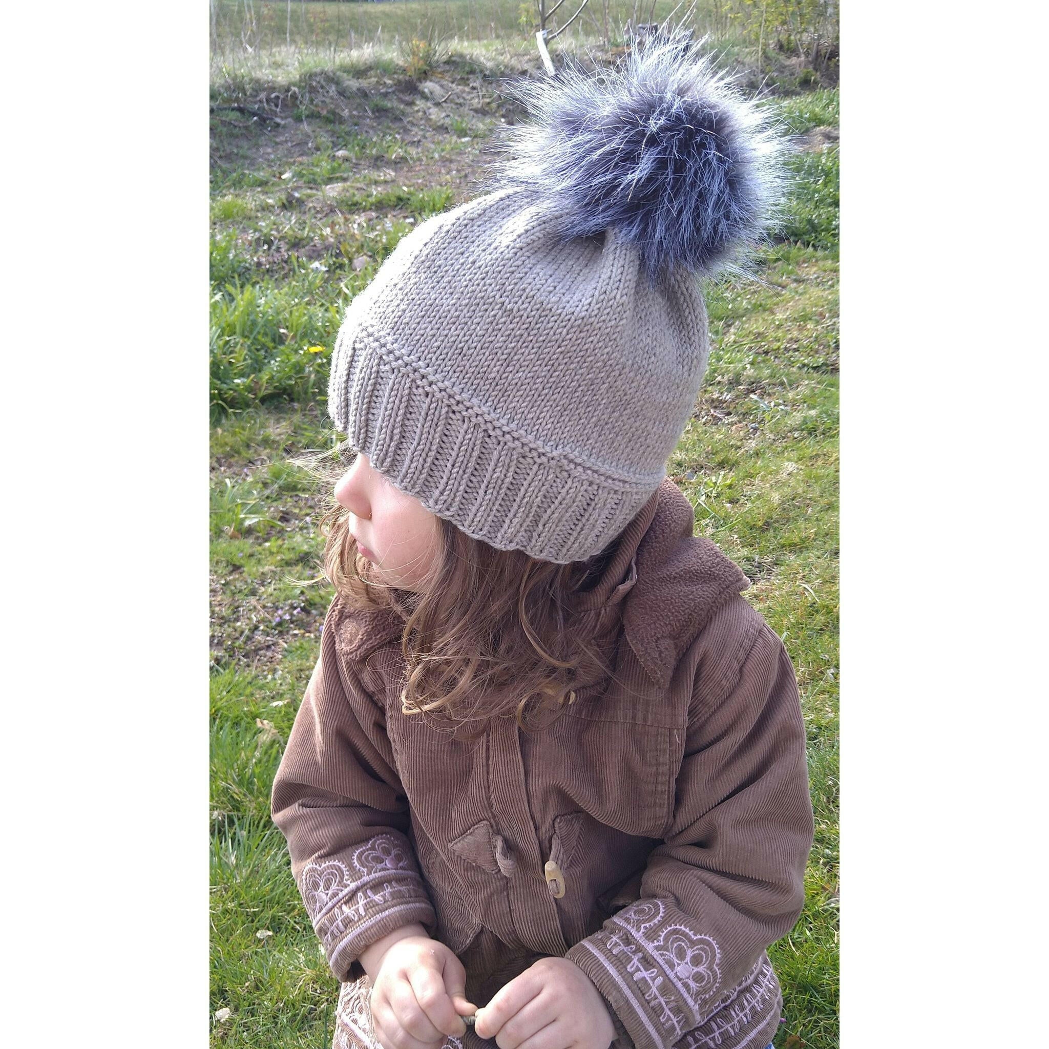 Gray Knitted Hat With Pompom.