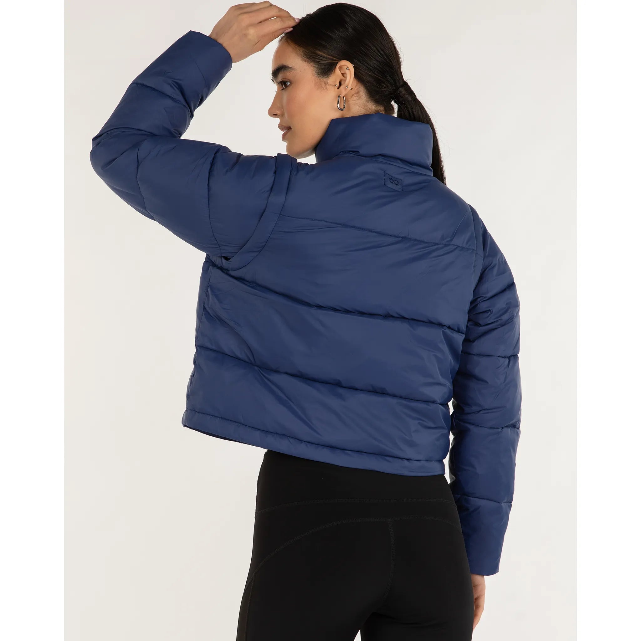 On the Go Puffer Convertible Jacket Vest.